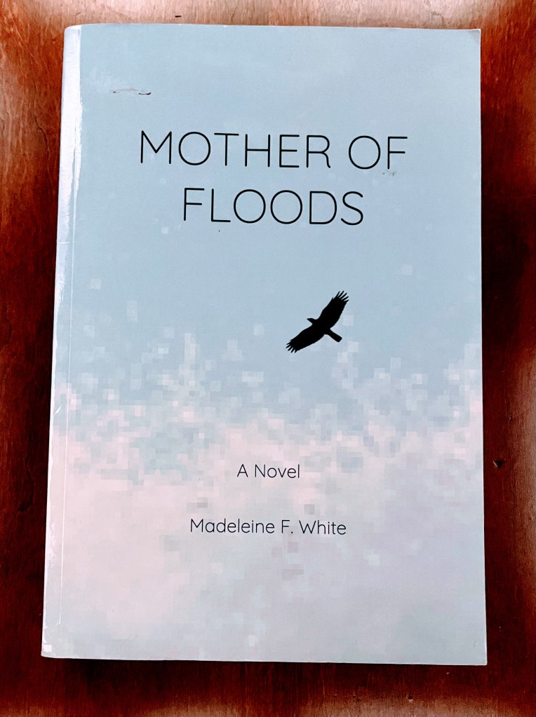 Photo (taken by Rita E. Gould) of the book cover for Mother of Floods by Madeleine F. White.