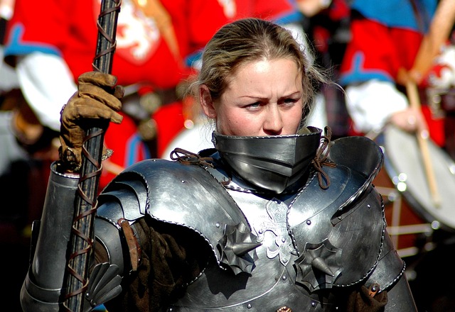 Woman in armor, symbolizing self-protection.